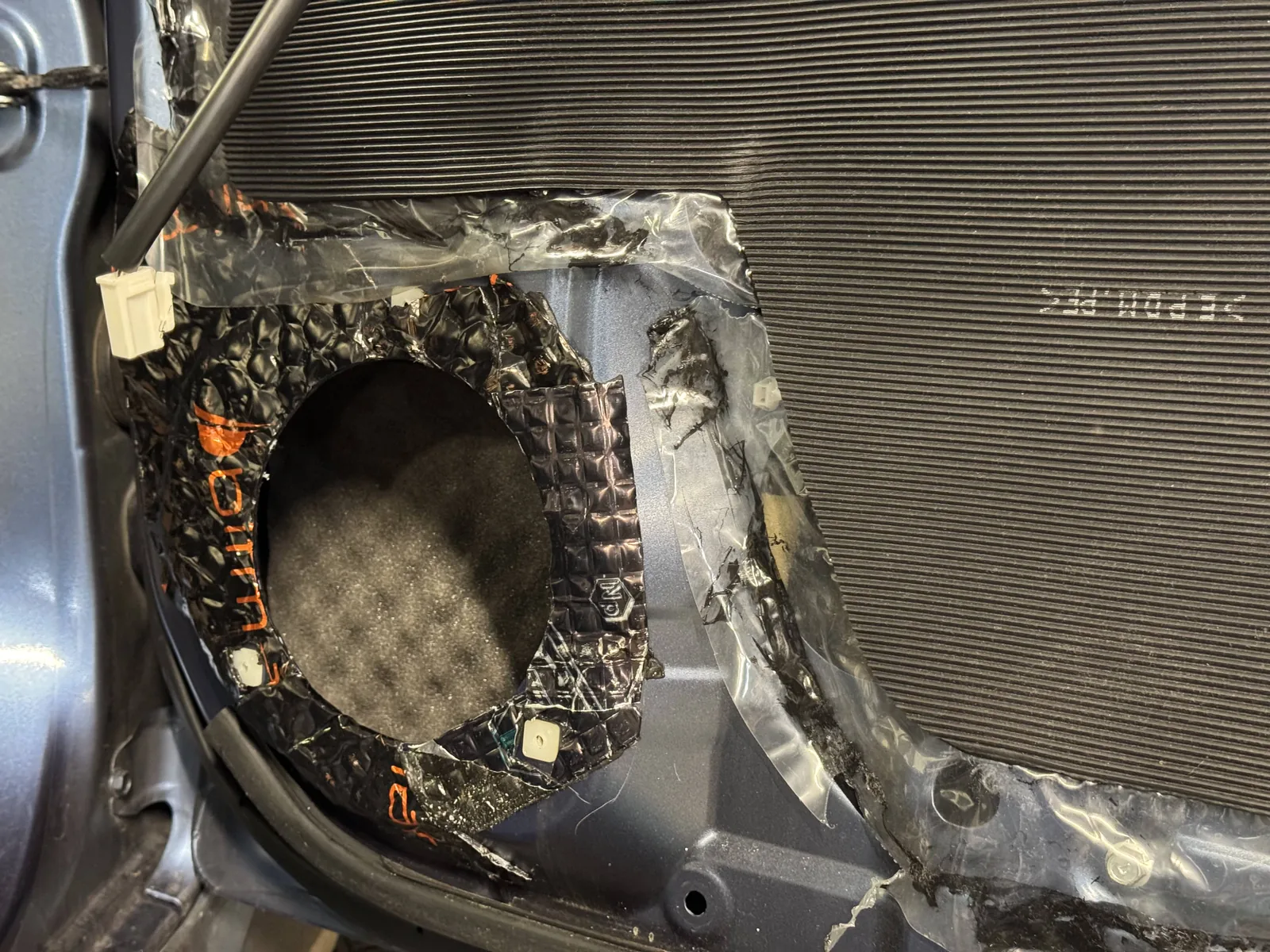Subaru Impreza door speaker mounting area and sound deadening material