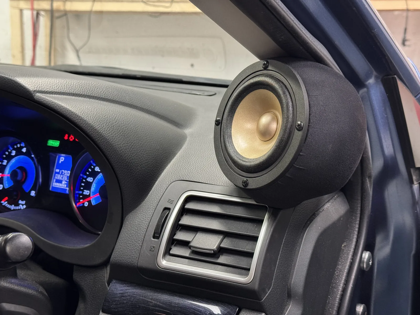 Custom Akisui full range speaker installed near Subaru Impreza dashboard and A pillar