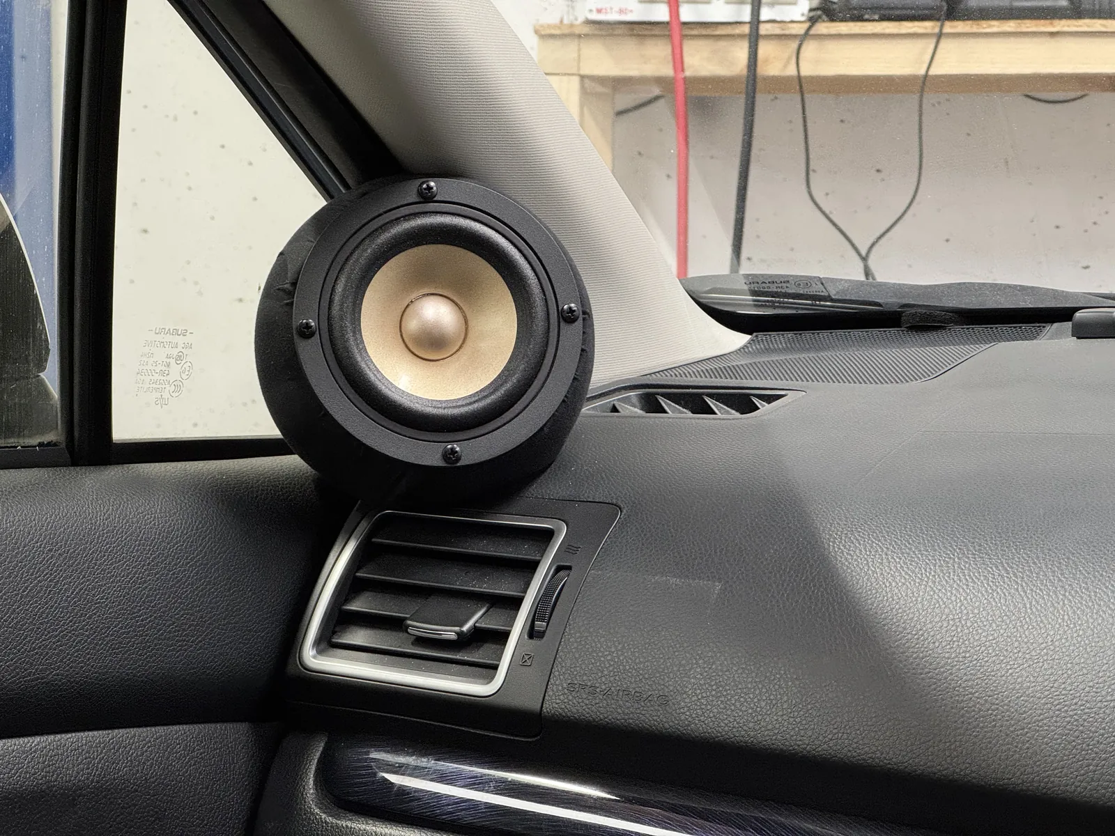 Passenger side custom full range speaker enclosure in Subaru Impreza